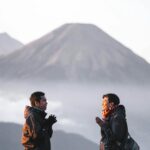 men near mountain