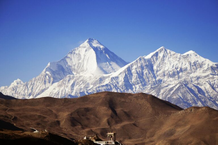 soil and glacier mountains during day