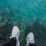 relaxing by the waterside in comfortable sneakers