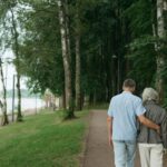 man and woman walking on the park