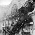 black steam train on building