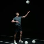 photo of a man playing volleyball