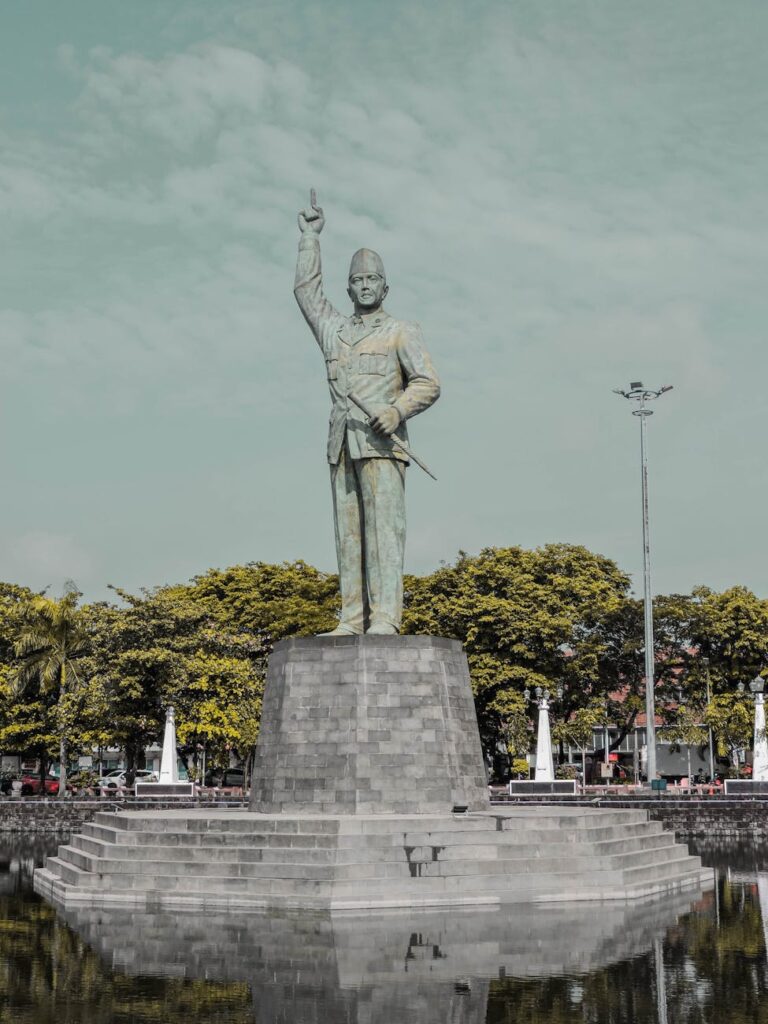 hero monument in the middle of the dam