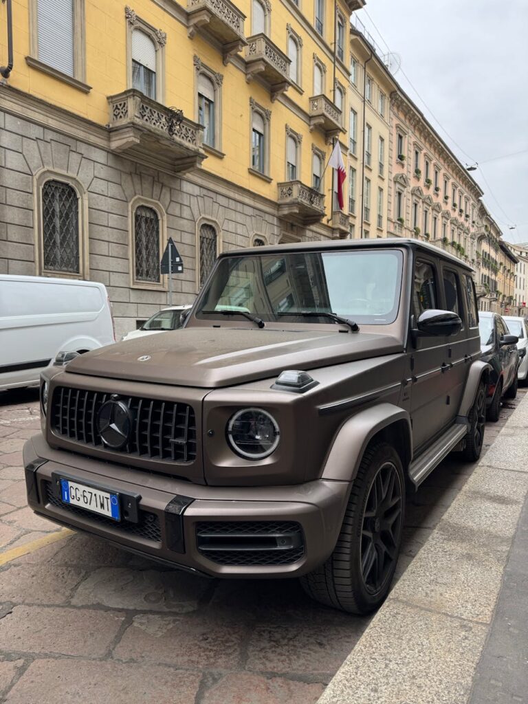 luxury suv on european street scene