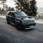 luxurious range rover on scenic road in bosnia