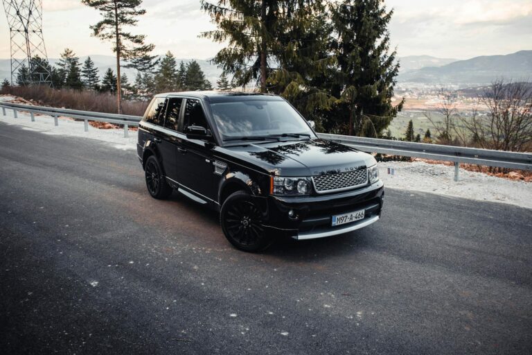 luxurious range rover on scenic road in bosnia
