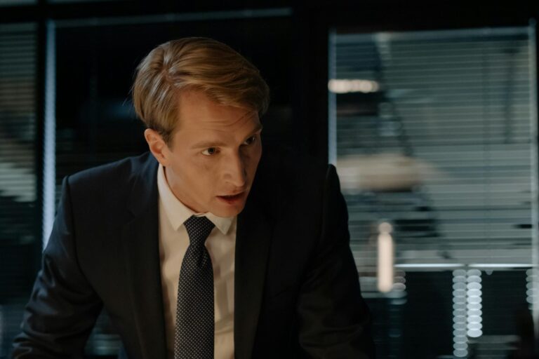 a man in a suit talking