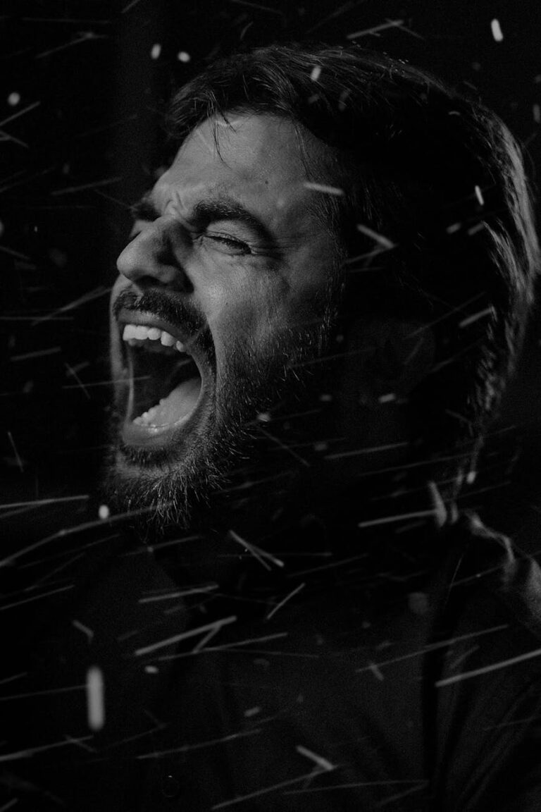 depressed man shouting black and white