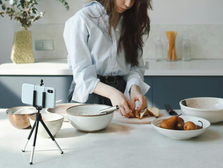 young woman slicing peach fruit